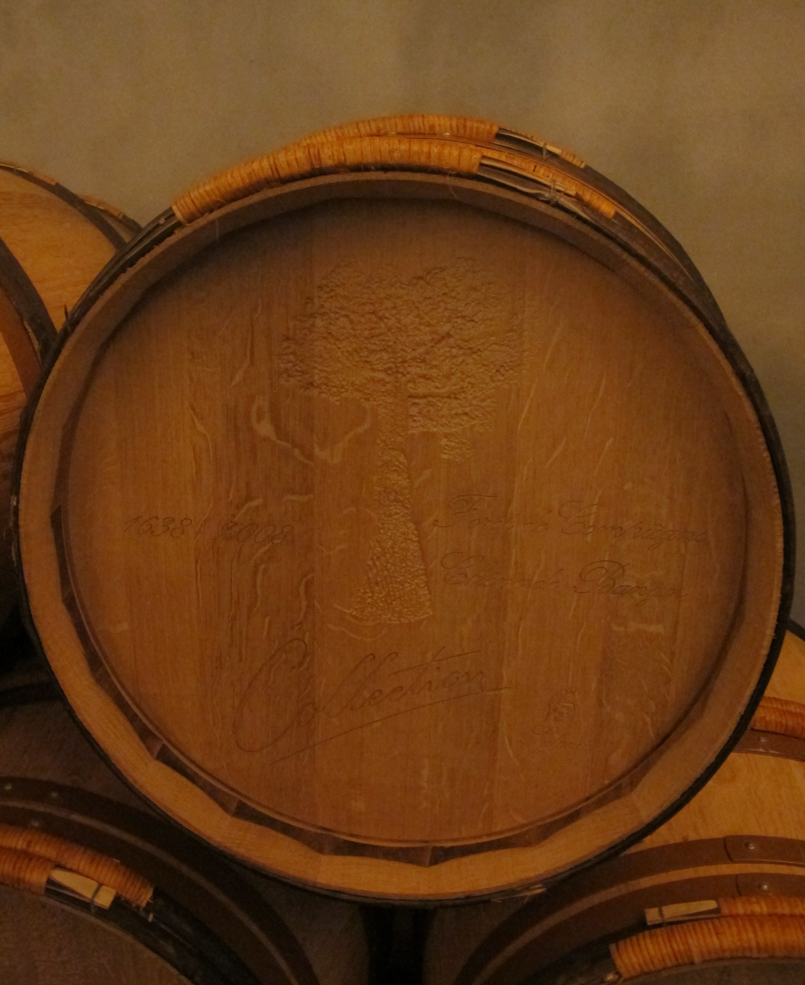 Beautifully carved wooden barrel.