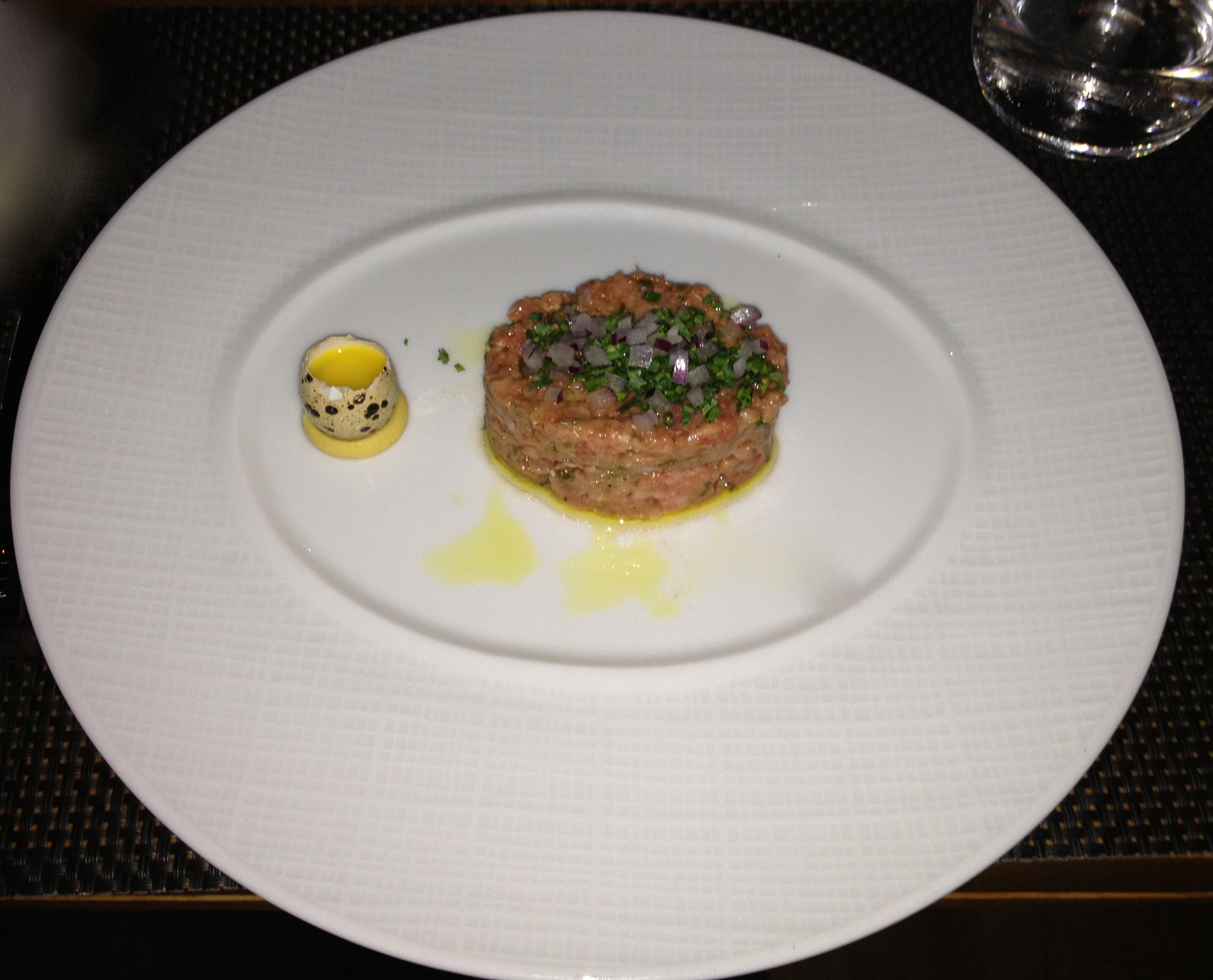 Raw beef tartare with quail egg