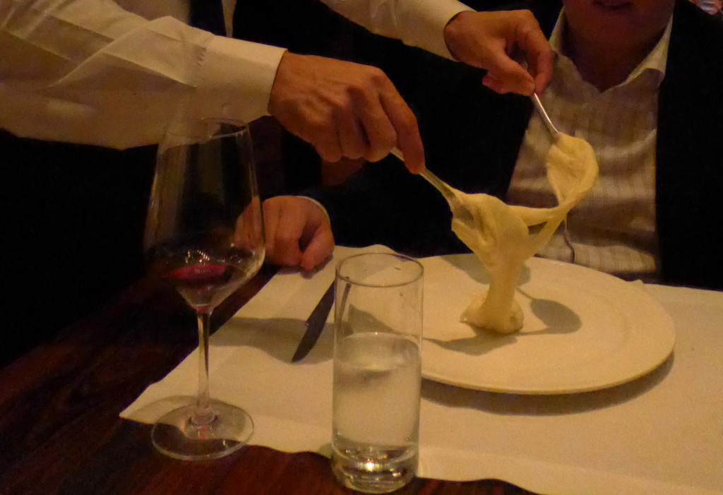 Pulling up the sticky Aligot at D.O.M